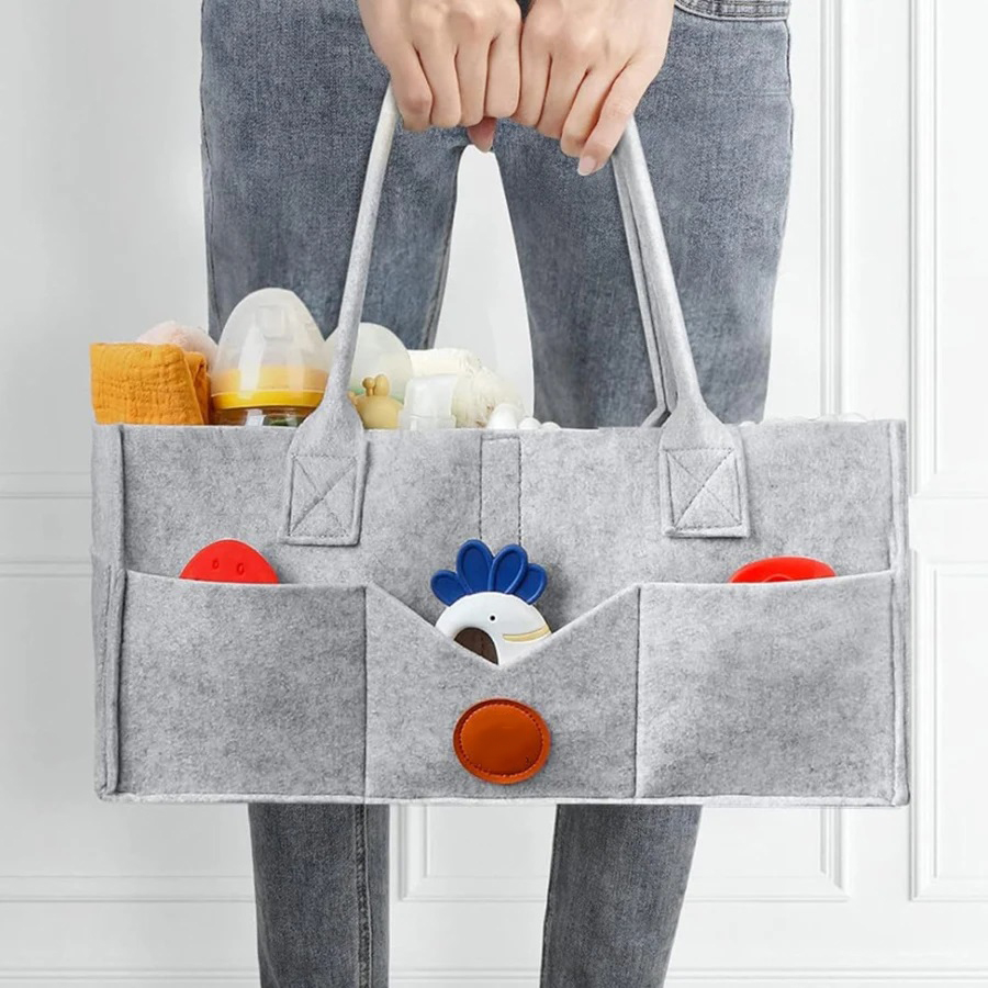 Vilten luieropbergtas voor kin - Baby Nursery Organizer recensie en prijs